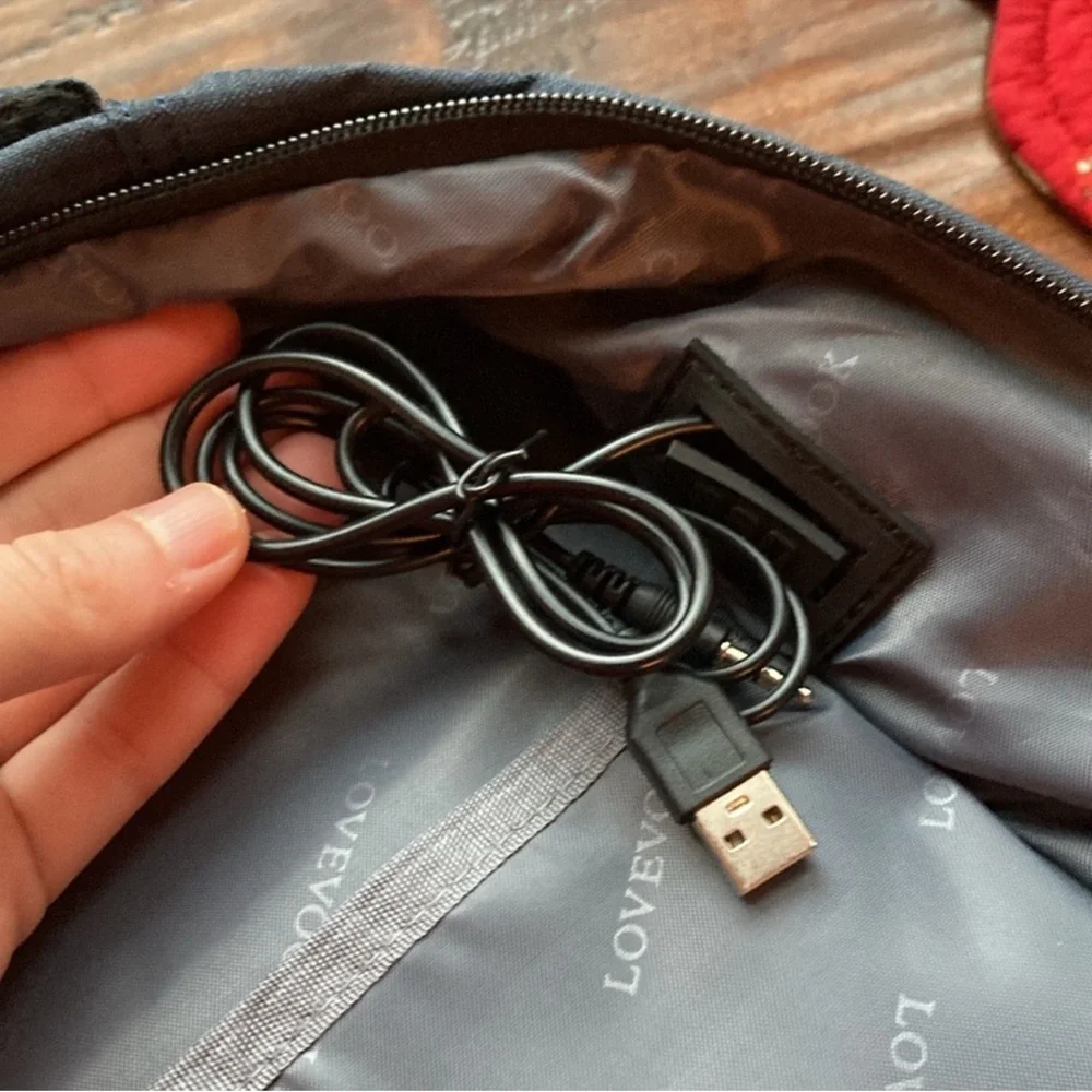Lovevook brand new blue backpack with
USB. Three main pockets - Picture 6 of 8
